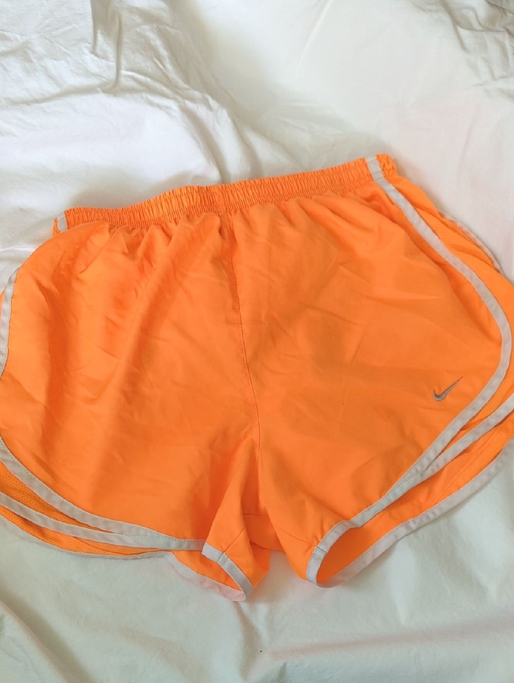 Nike Women's Neon Orange Athletic Shorts with Reflective Trim